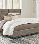 Signature Design by Ashley Wittland Queen Upholstered Panel Bed-Brown