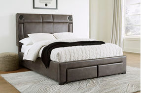 Signature Design by Ashley Mirlenz Queen Upholstered Bed with Storage-Brown