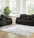 Signature Design by Ashley Cordelian Reclining Sofa and Loveseat-Black