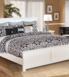 Signature Design by Ashley Bostwick Shoals King Panel Bed, Dresser, Mirror and