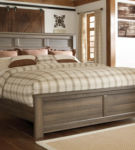 Signature Design by Ashley Juararo California King Panel Bed-Dark Brown