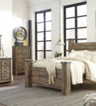 Signature Design by Ashley Trinell Queen Poster Bed-Brown