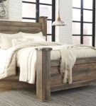 Signature Design by Ashley Trinell Queen Poster Bed-Brown