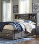 Signature Design by Ashley Caitbrook King Storage Bed, Dresser, Mirror and Nig