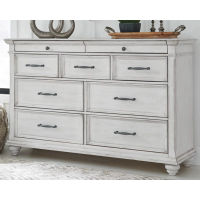 Benchcraft Kanwyn Queen Upholstered Panel Bed, Dresser, and Nightstand