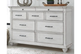 Benchcraft Kanwyn Queen Upholstered Panel Bed, Dresser, and Nightstand