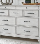 Benchcraft Kanwyn Queen Upholstered Panel Bed, Dresser, and Nightstand