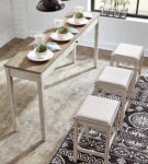 Signature Design by Ashley Skempton Counter Height Dining Table and 3 Bar Stools