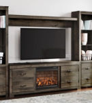Signature Design by Ashley Trinell 4-Piece Entertainment Center with Electric