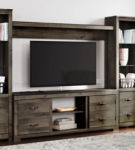 Signature Design by Ashley Trinell 4-Piece Entertainment Center-Brown