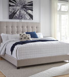 Signature Design by Ashley Dolante Queen Tufted Upholstered Bed - Beige - Sample Room View