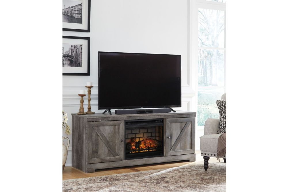 Signature Design by Ashley Wynnlow 63 Inch TV Stand with Electric Fireplace - Sample Room View