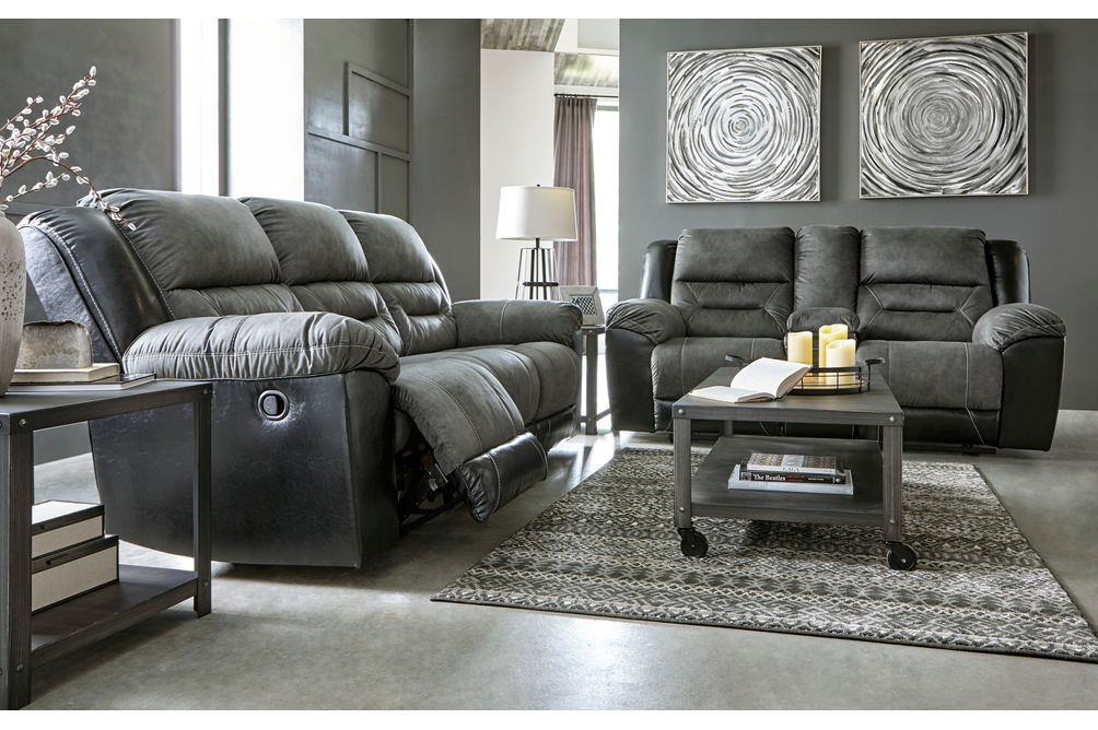 Signature Design by Ashley Earhart-Slate Reclining Sofa and Loveseat - Sample Room View