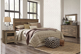 Signature Design by Ashley Trinell 4-Piece King Panel Bedroom Set - Sample Room View