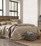 Signature Design by Ashley Trinell 4-Piece King Panel Bedroom Set - Sample Room View