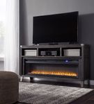 Signature Design by Ashley Todoe 65 Inch Electric Fireplace TV Stand - Sample Room View