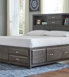 Signature Design by Ashley Caitbrook Queen Storage Bed - Sample Room View