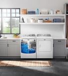 Maytag 4.5 Cu. Ft. Top Load Washer + 7.0 Cu. Ft. Electric Dryer Bundle - Sample Room View