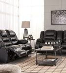 Signature Design by Ashley Vacherie-Black Reclining Sofa and Loveseat - Sample Room View