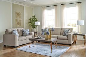 Signature Design by Ashley Deltona-Parchment Sofa and Loveseat - Sample Room View