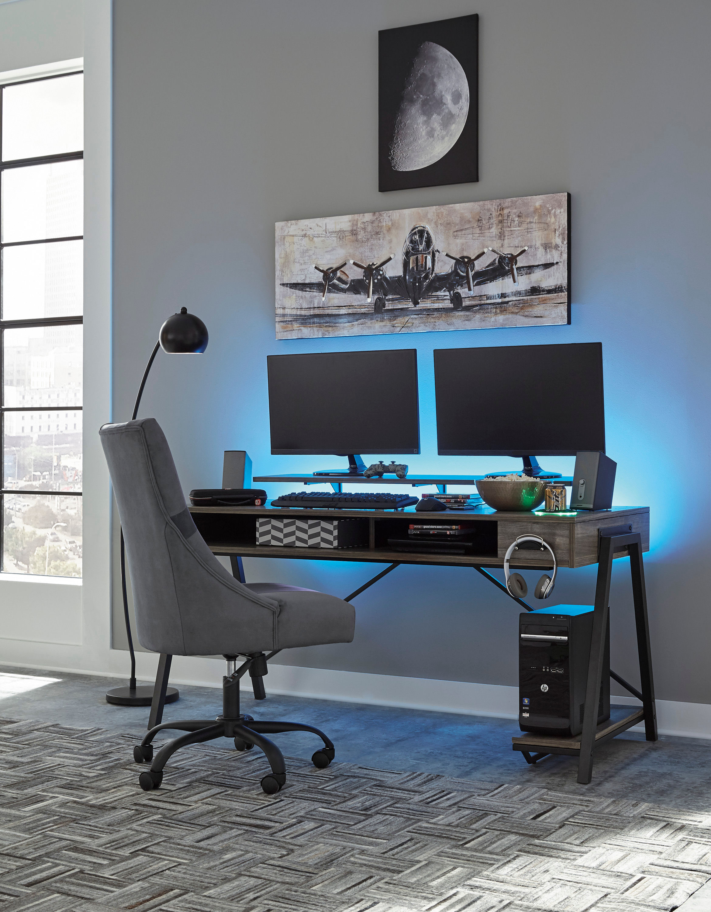 Rent Signature Design by Ashley Barolli Gray Gaming Desk. Same Day Delivery at Rent A Center
