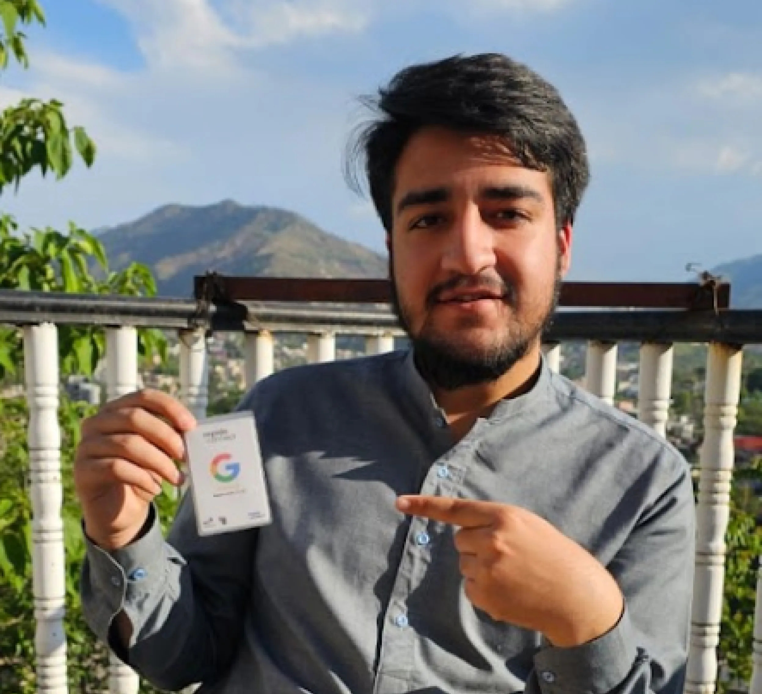 Client holding card 1