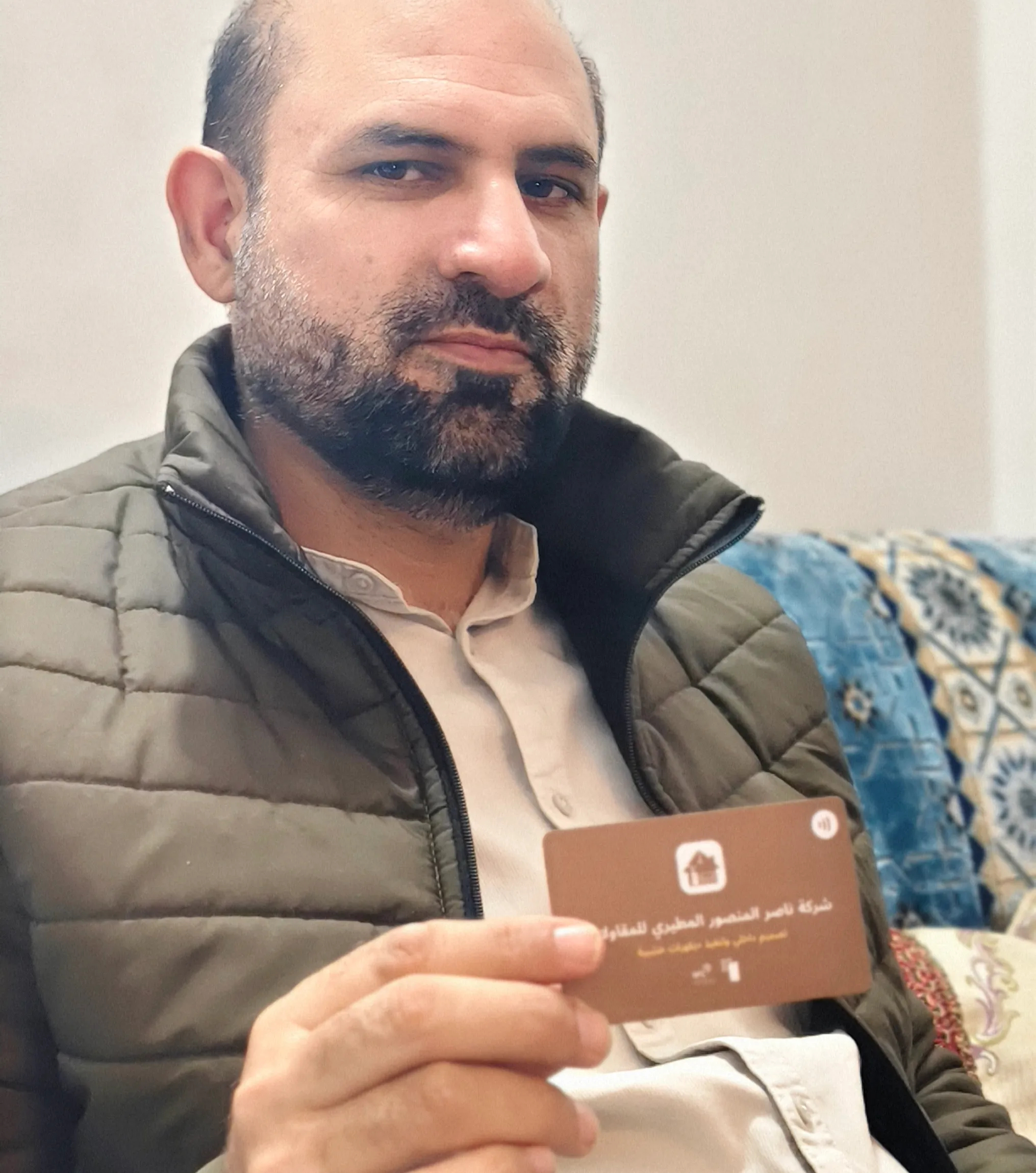 Client holding card 11