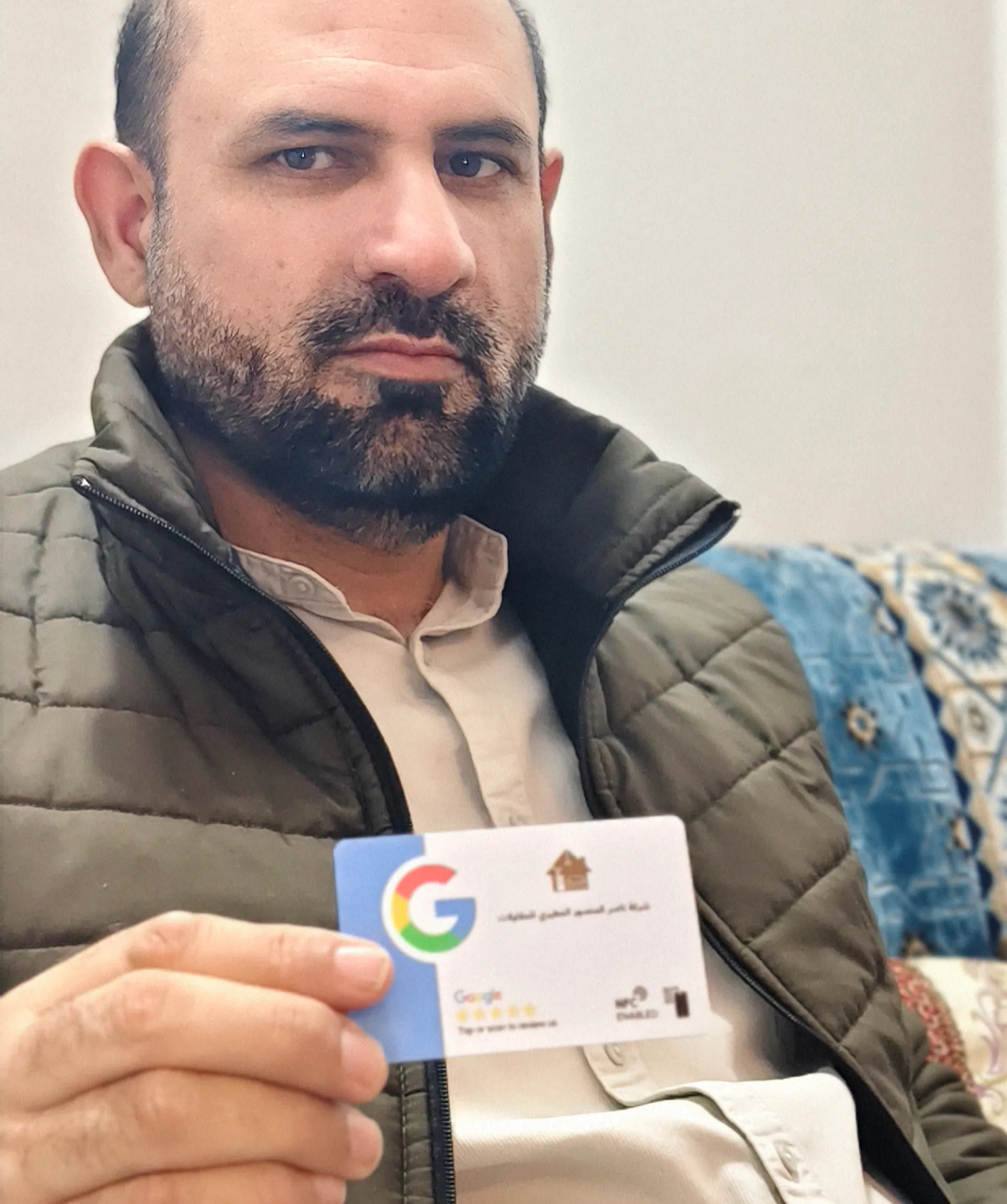 Client holding card 12