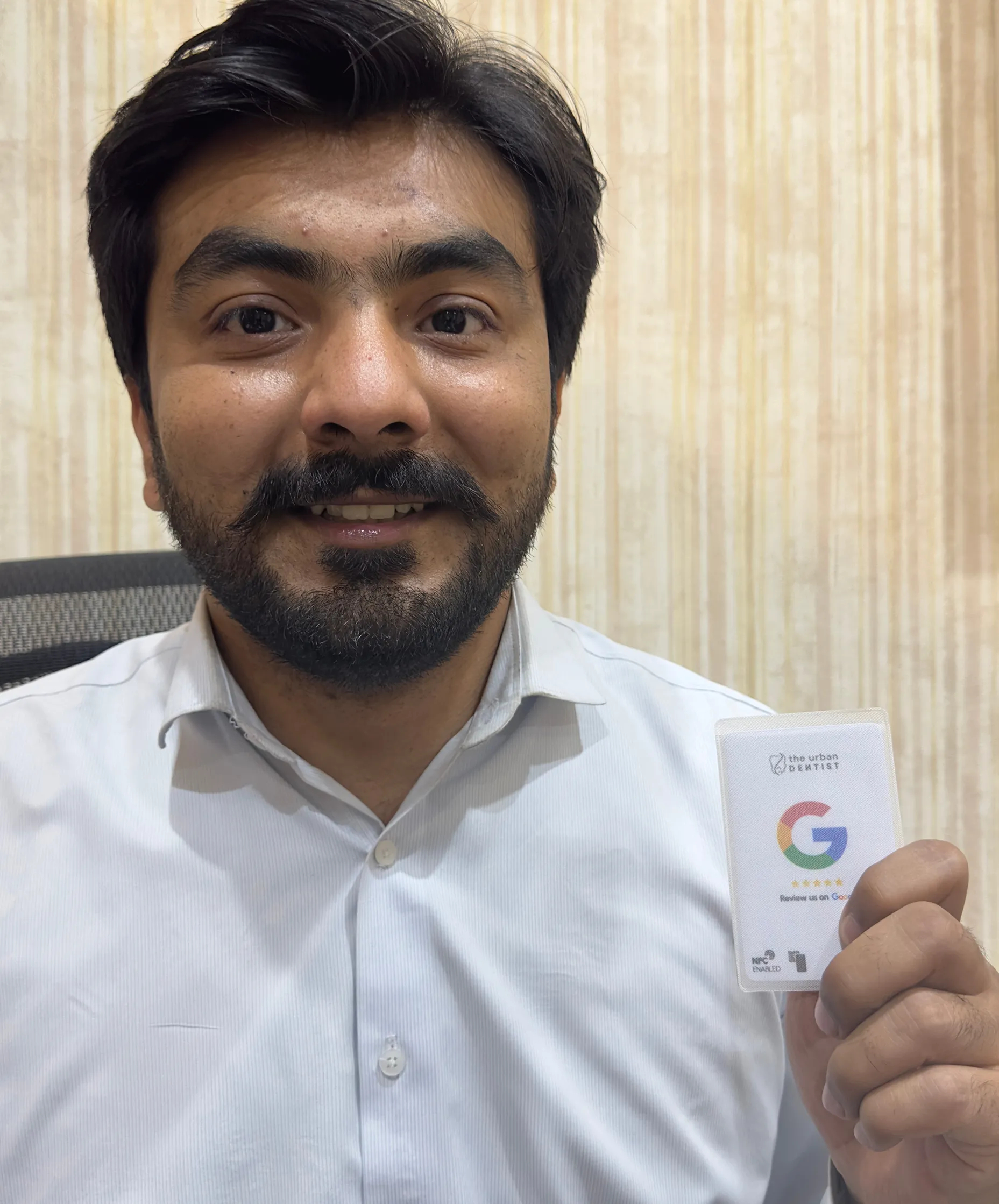 Client holding card 14