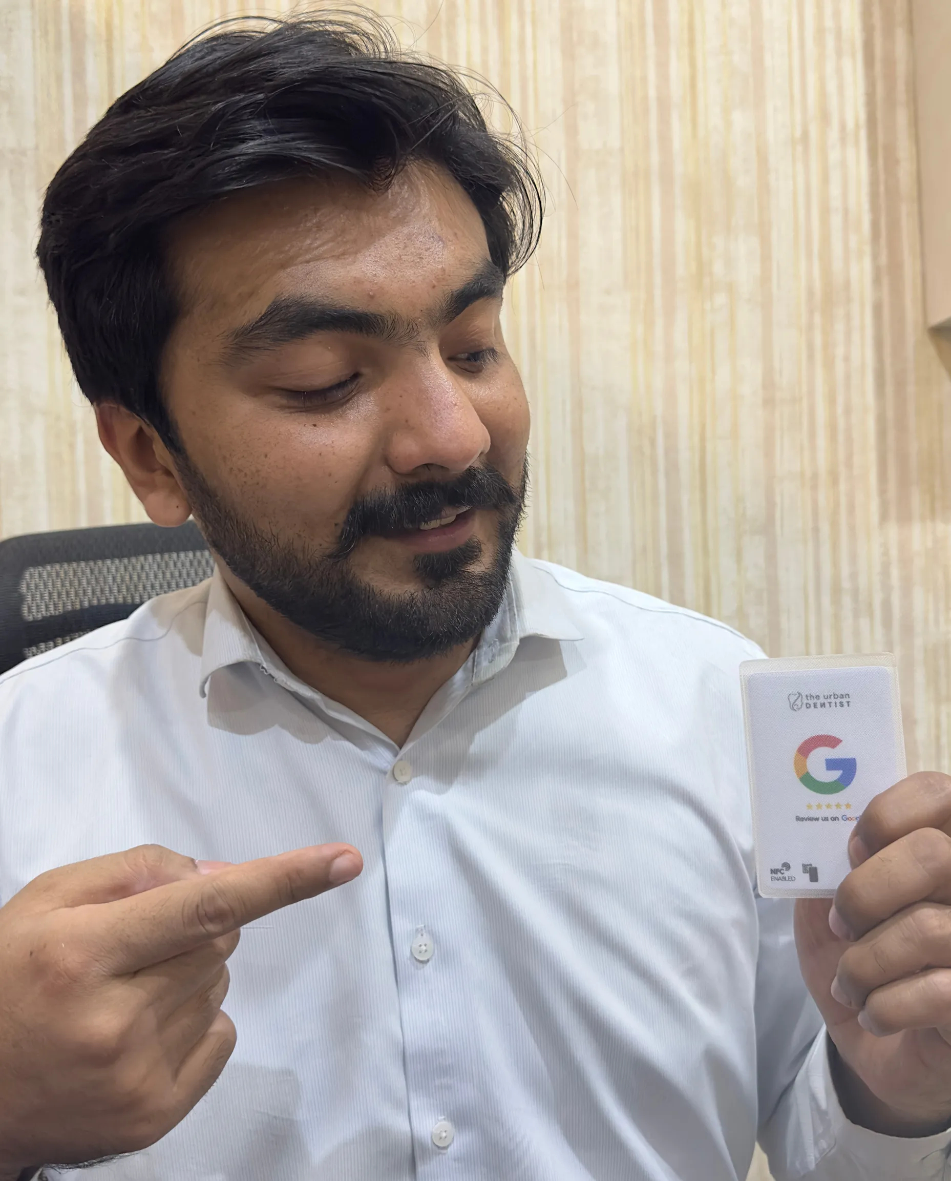 Client holding card 15