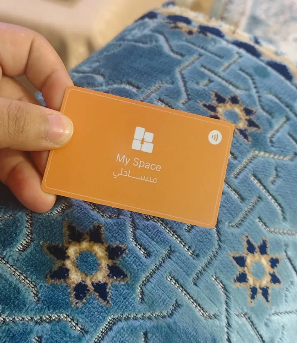 Client holding card 18