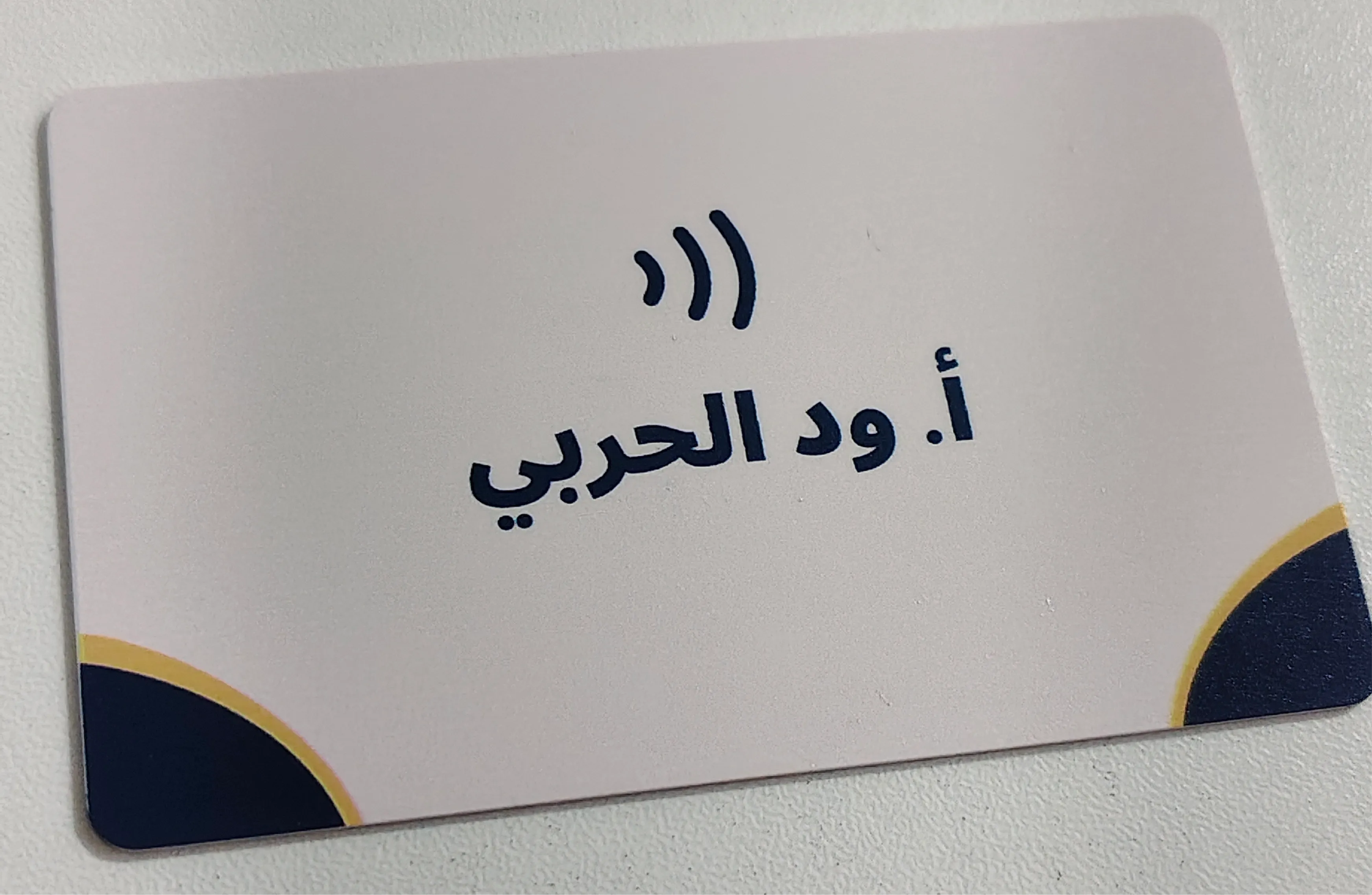 Client holding card 27