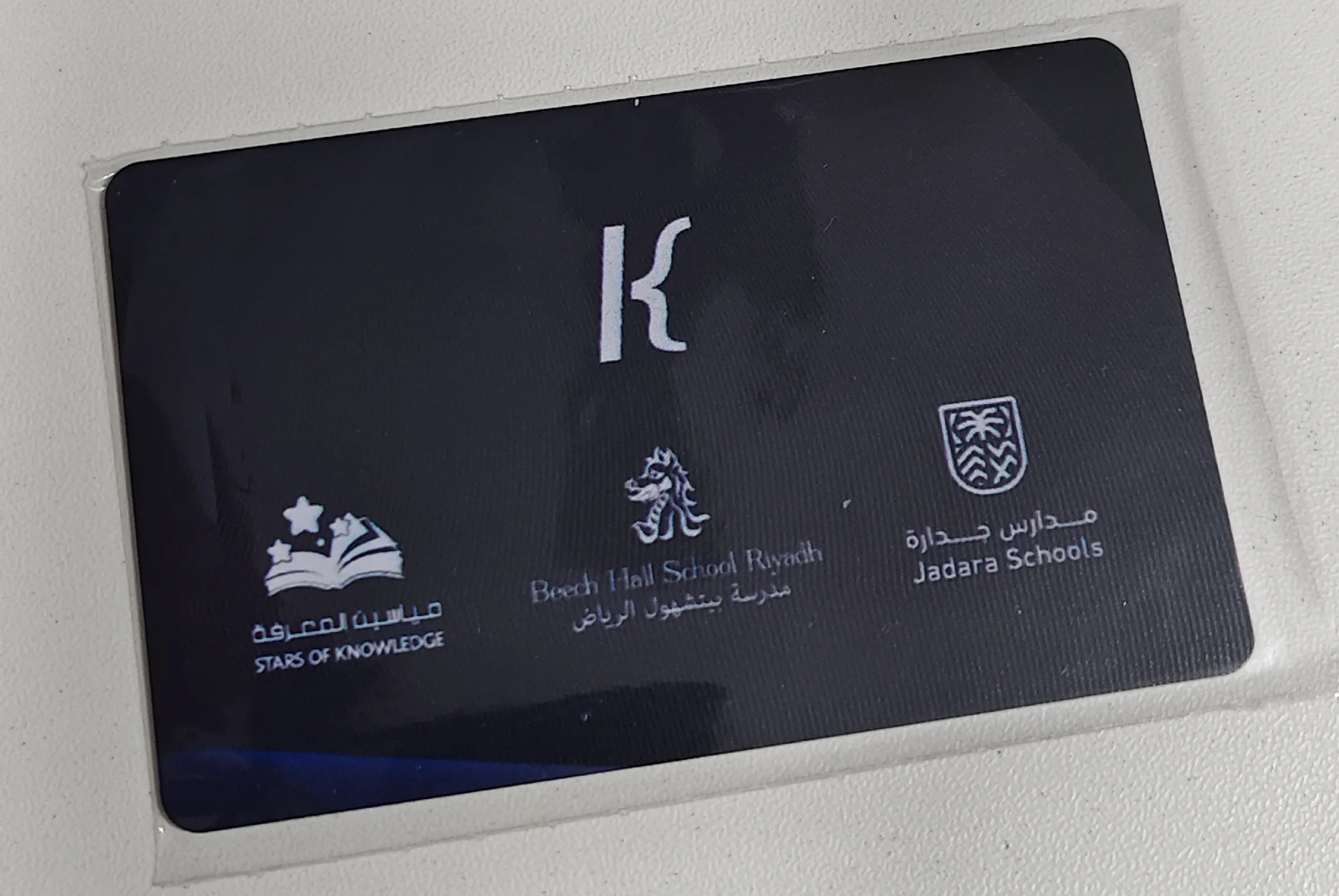 Client holding card 36