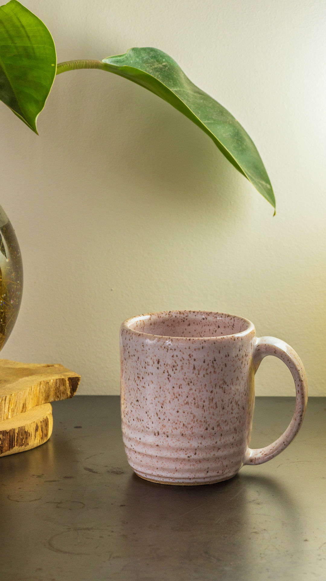 Pink mug with plant