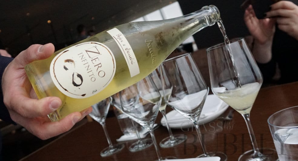 Pouring Pétillant Naturel sparkling wine Pouring Pétillant Naturel sparkling wine