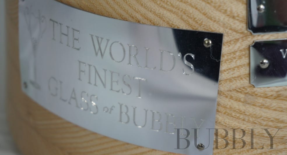 The Worlds Finest Glass of Bubbly Badge trophy base The Worlds Finest Glass of Bubbly Badge trophy base