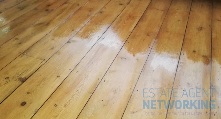 Adding second coat of varnish floor boards