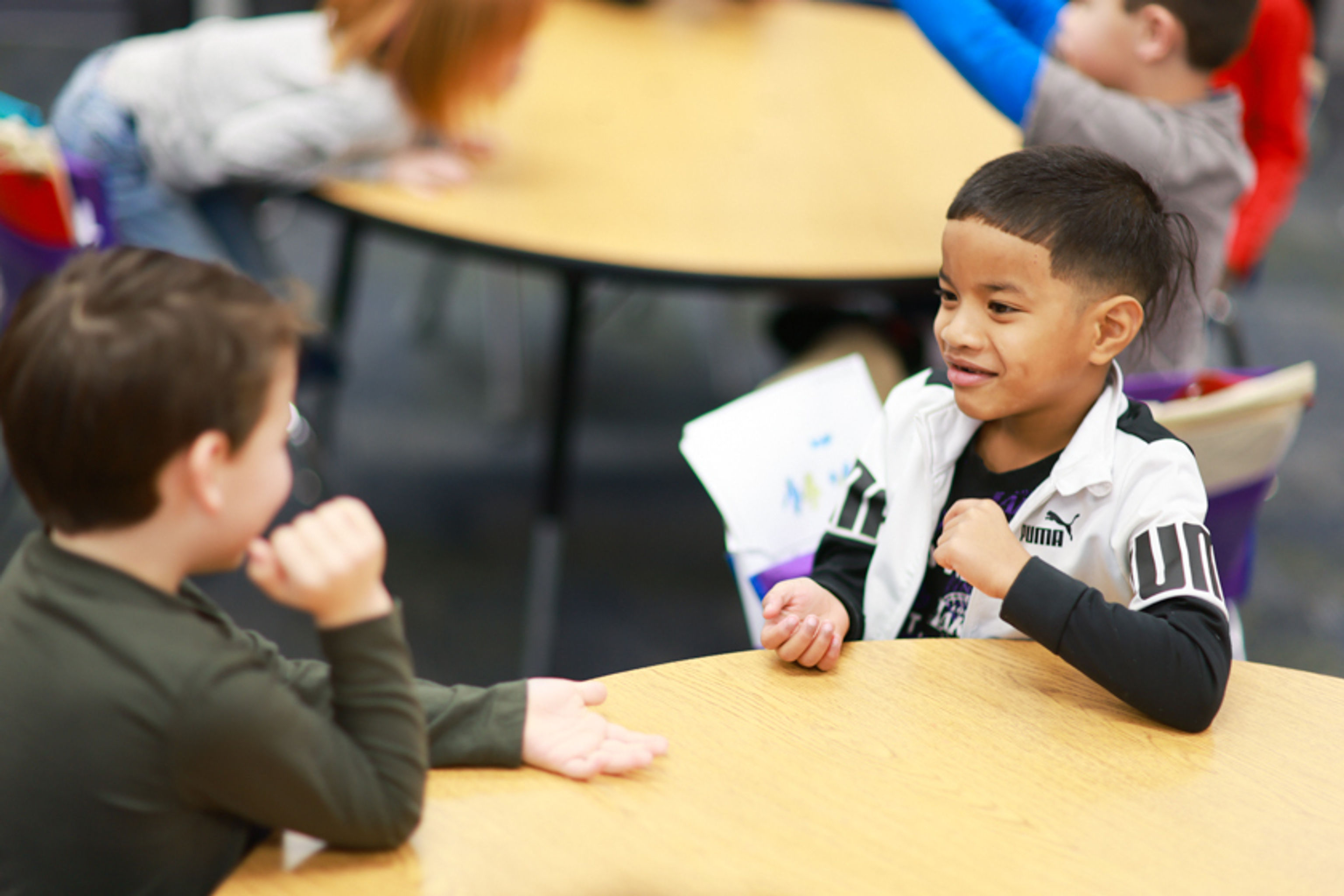 Two students sitting at a classroom table