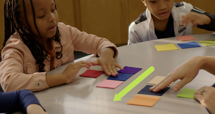 Students manipulating felt squares