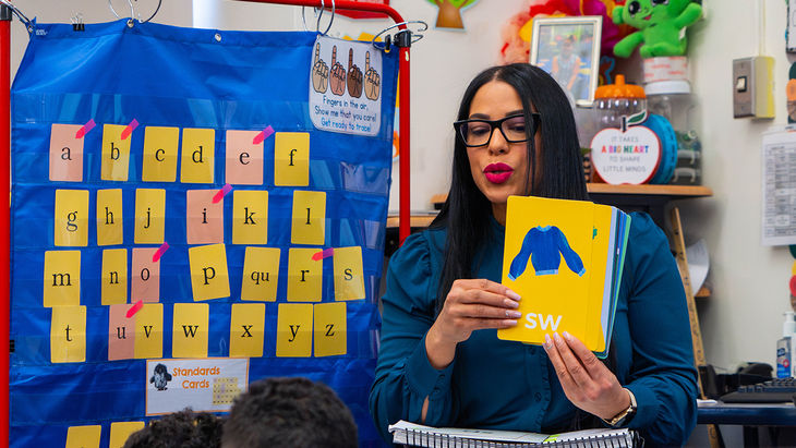 Teacher using flashcards to teach blends to students