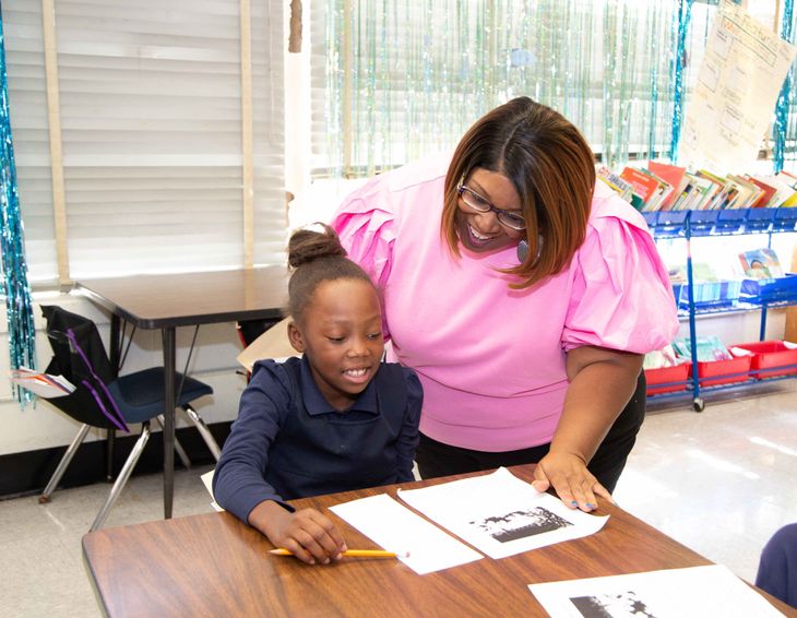 Teacher helps her student with inferencing.