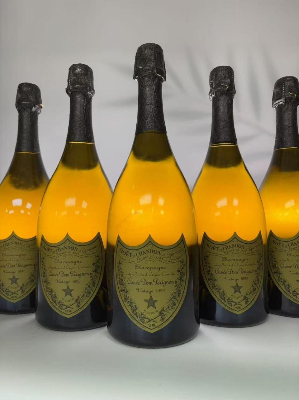 Dom Pérignon 香檳王瓶底編號與玻璃壓印真偽辨識示意
