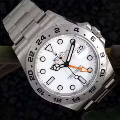 勞力士 Explorer II Polar 白面、固定 24 小時外圈與橙色 GMT 針