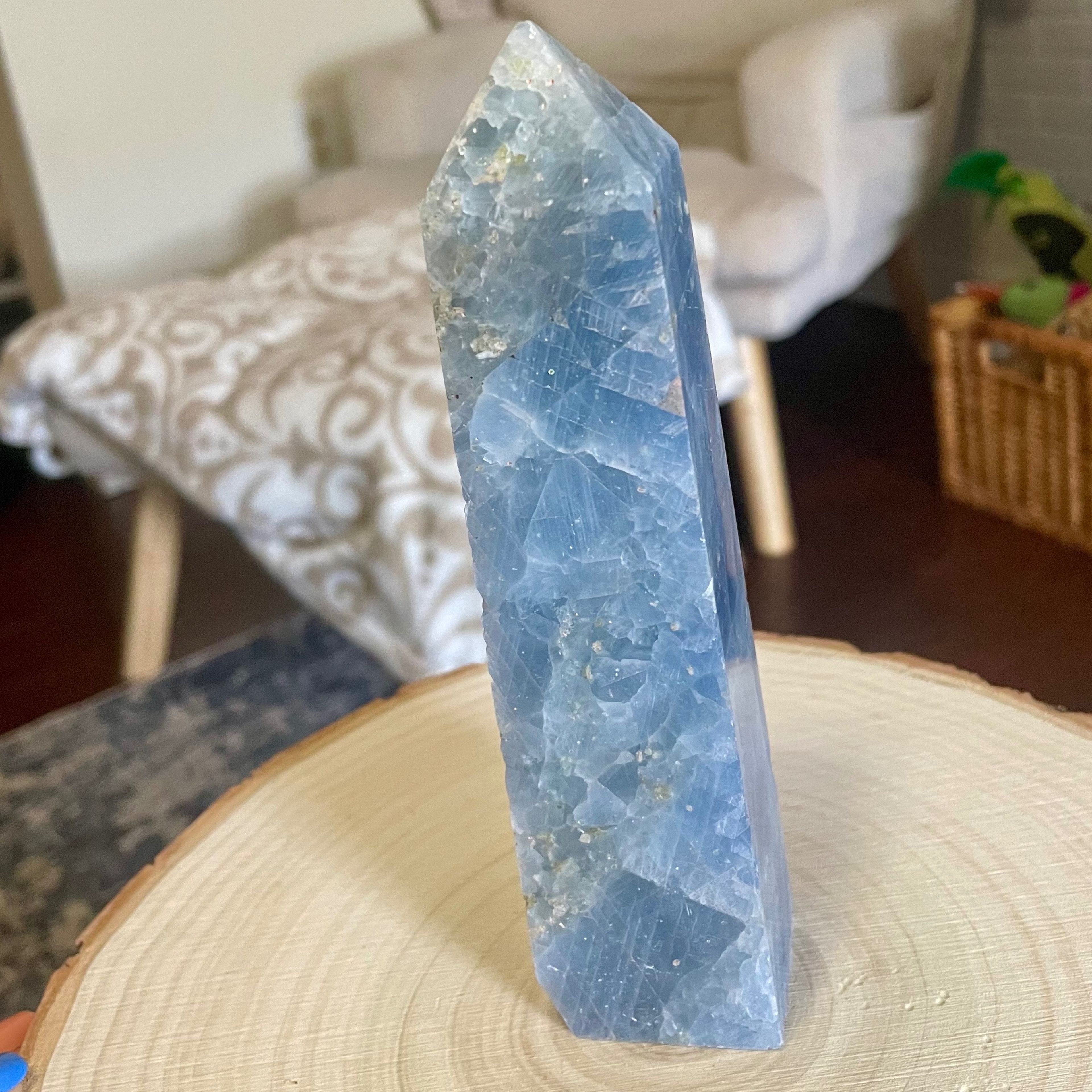 Large blue Calcite tower with iron blemishes