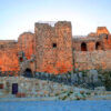 Ruins of Ajlun castle in Jordan on a sunny day.