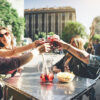 Tourist woman drinking cocktails in Madrid