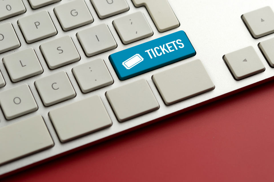 Ticket button on a keyboard symbolizing easy access to buying ang selling tickets online