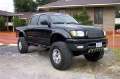 Picture of N-Fab Nerf Step 01-04 Toyota Tacoma Double Cab 5ft Bed - Gloss Black - W2W - 3in