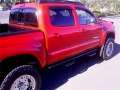 Picture of N-Fab Nerf Step 05-15 Toyota Tacoma Double Cab - Gloss Black - Cab Length - 2in