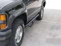 Picture of N-Fab Nerf Step 92-99 Chevy-GMC Tahoe-Yukon-SilveradoMexico SUV 2 Door - Gloss Black - W2W - 3in